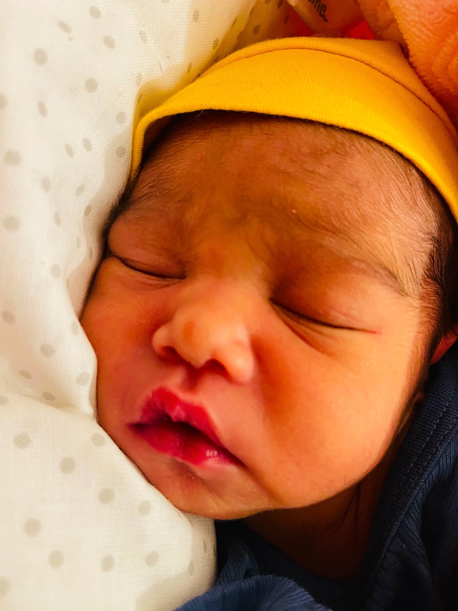 Bishop is registered to the contest to win money with this photo: baby, baby_sleeping, bedtime, cheek, child, chin, comfort, ear, eyebrow, eyelash, forehead, happy, headgear, linens, lip, mouth, nose, person, skin, smile