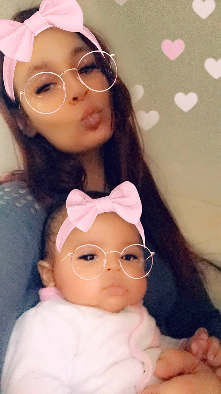 Soukaina participe au concours pour gagner de l'argent avec cette photo : black_hair, brown_hair, cheek, child, doll, ear, eyewear, fawn, glasses, head, headwear, lip, nose, people, person, pink, skin, smile, toy, vision_care