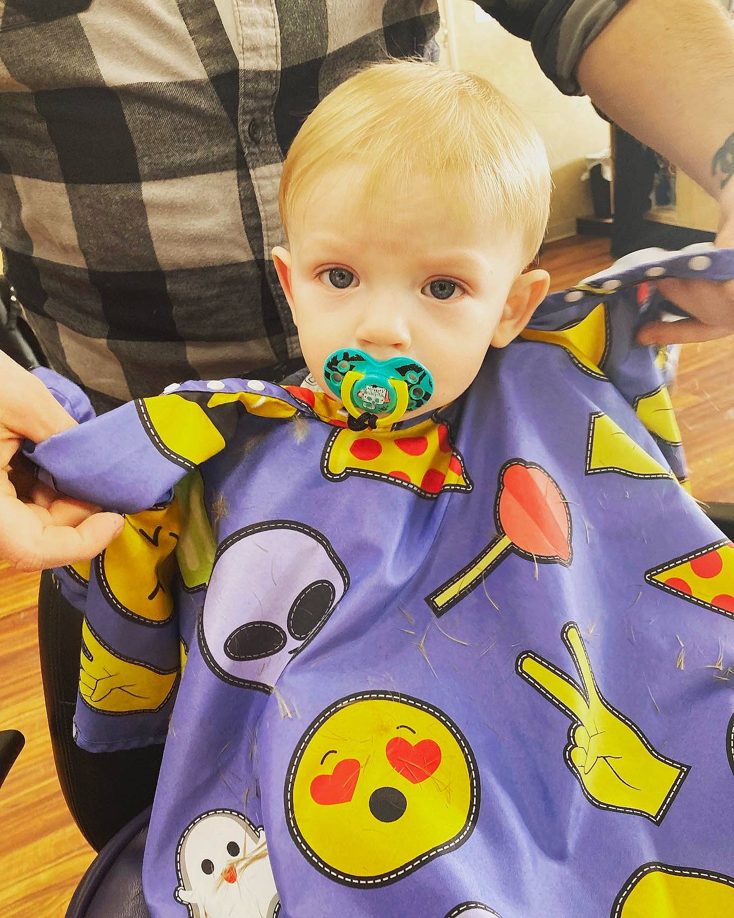 Calvin is registered to the contest to win money with this photo: baby, baby_products, baby_toddler_clothing, cheek, child, costume, fictional_character, fun, happy, outerwear, pattern, person, play, product, sitting, sleeve, t_shirt, tartan, textile, toddler