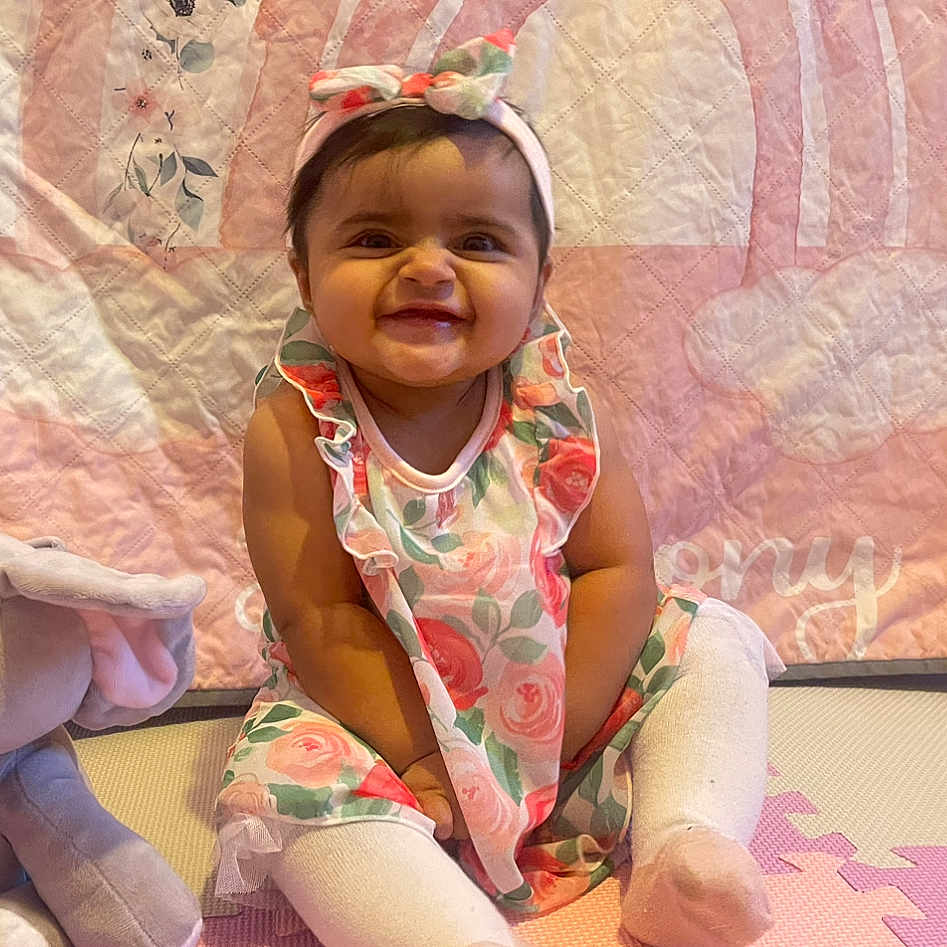 Harmony joined the competition — help win amazing prizes! applique, baby, babylaughing, clothing, couch, cushion, dress, face, furniture, happy, hat, head, homedecor, laughing, person, photography, portrait, quilt, sitting, smile