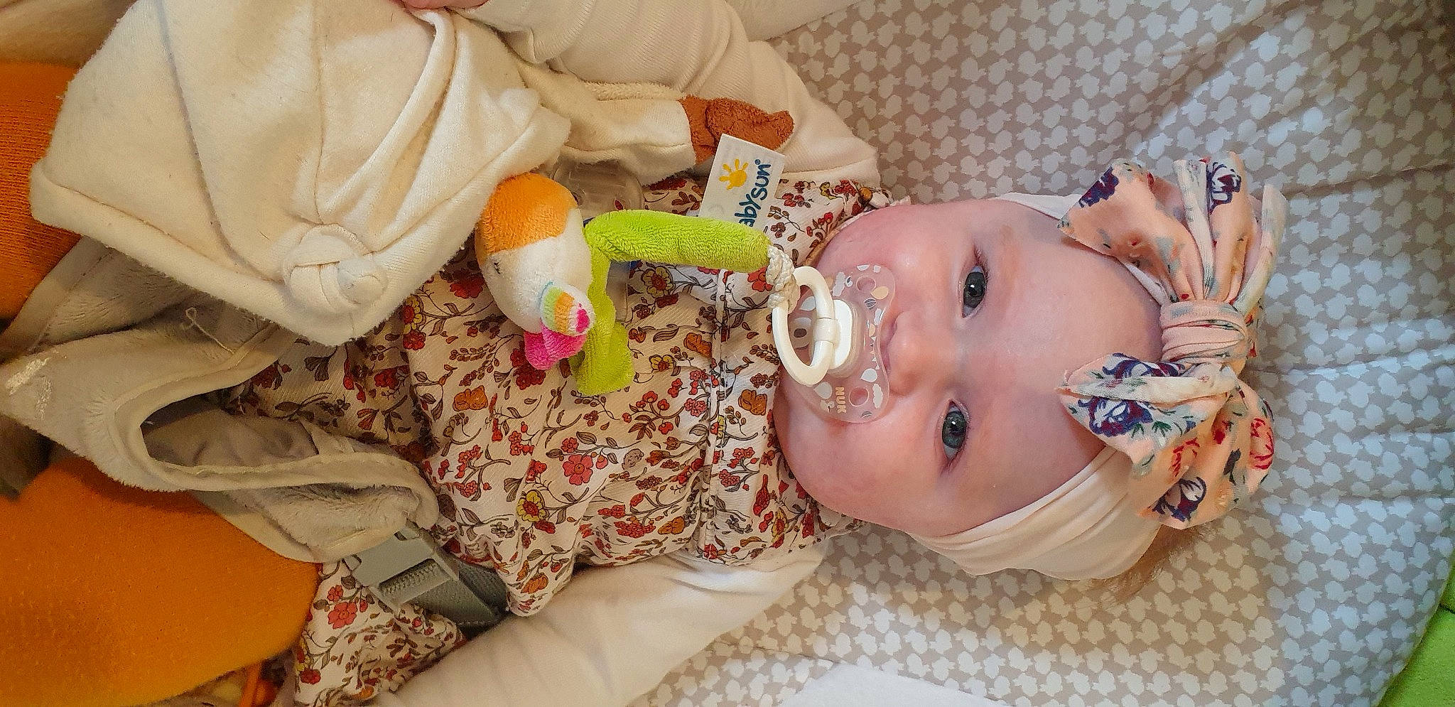 Milla participe au concours pour gagner de l'argent avec cette photo : baby, baby_toddler_clothing, cheek, child, ear, eyelash, finger, happy, head, headwear, human_body, iris, lip, mammal, mouth, nail, nose, person, skin, smile