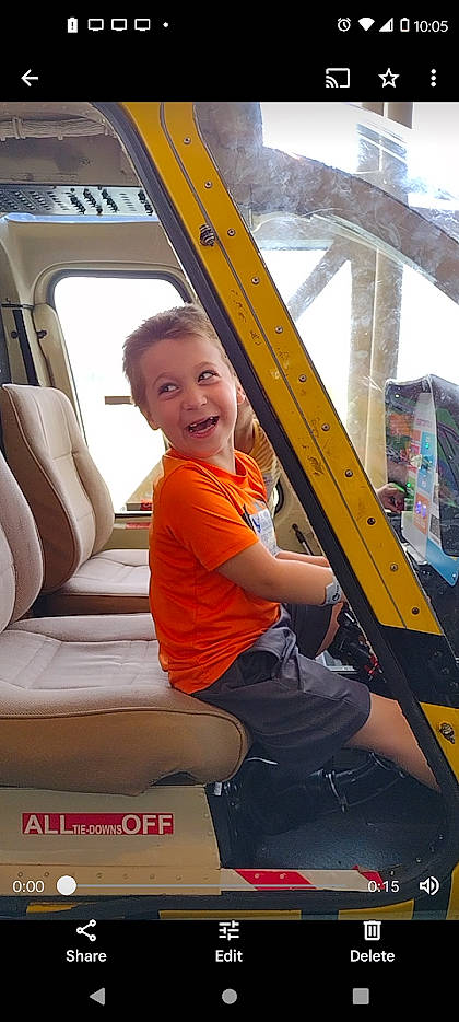 Tyson is registered to the contest to win money with this photo: auto_part, automotive_design, automotive_exterior, automotive_wheel_system, automotive_window_part, car_seat_cover, fun, happy, leisure, mode_of_transport, motor_vehicle, person, product, recreation, shorts, smile, t_shirt, toddler, travel, vehicle_door