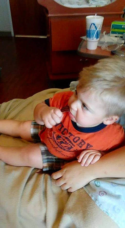 Tyson joined the competition — help win amazing prizes! baby, baby_toddler_clothing, cheek, comfort, elbow, finger, flooring, fun, joint, nail, pattern, person, play, sitting, sleeve, t_shirt, thigh, thumb, toddler, wood