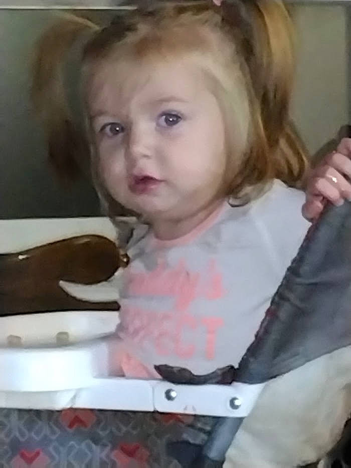 Kennedy is registered to the contest to win money with this photo: baby, baby_carriage, baby_products, baby_toddler_clothing, baking, blond, cheek, child, eyebrow, eyelash, hairstyle, happy, lip, organ, person, sitting, smile, sweetness, toddler