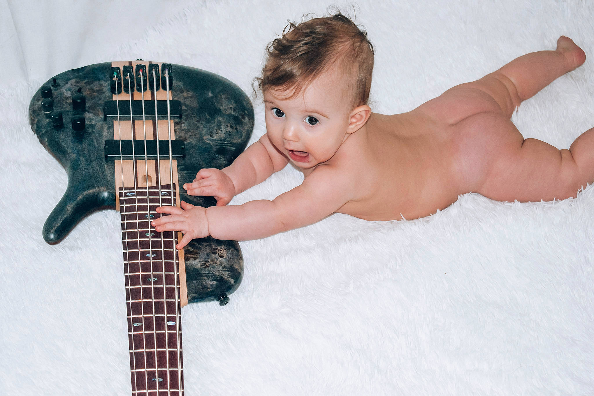 Layla Marie joined the competition — help win amazing prizes! arm, eye, eyebrow, facial_expression, guitar, guitar_accessory, hair, hand, human_body, leg, mammal, mouth, musical_instrument, neck, person, plucked_string_instruments, skin, string_instrument, string_instrument_accessory, surprise