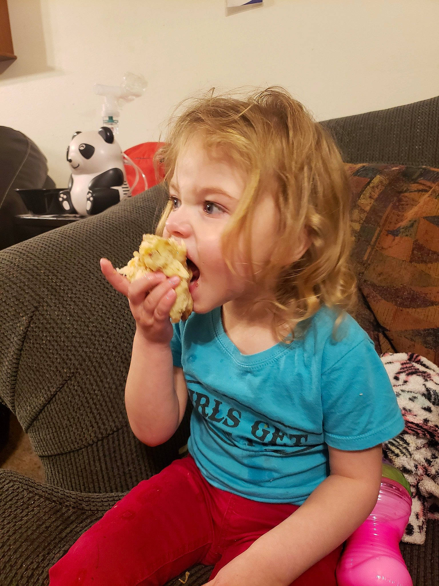 Matilda is registered to the contest to win money with this photo: child, eating, finger, food, junk_food, person, sitting, snack, toddler