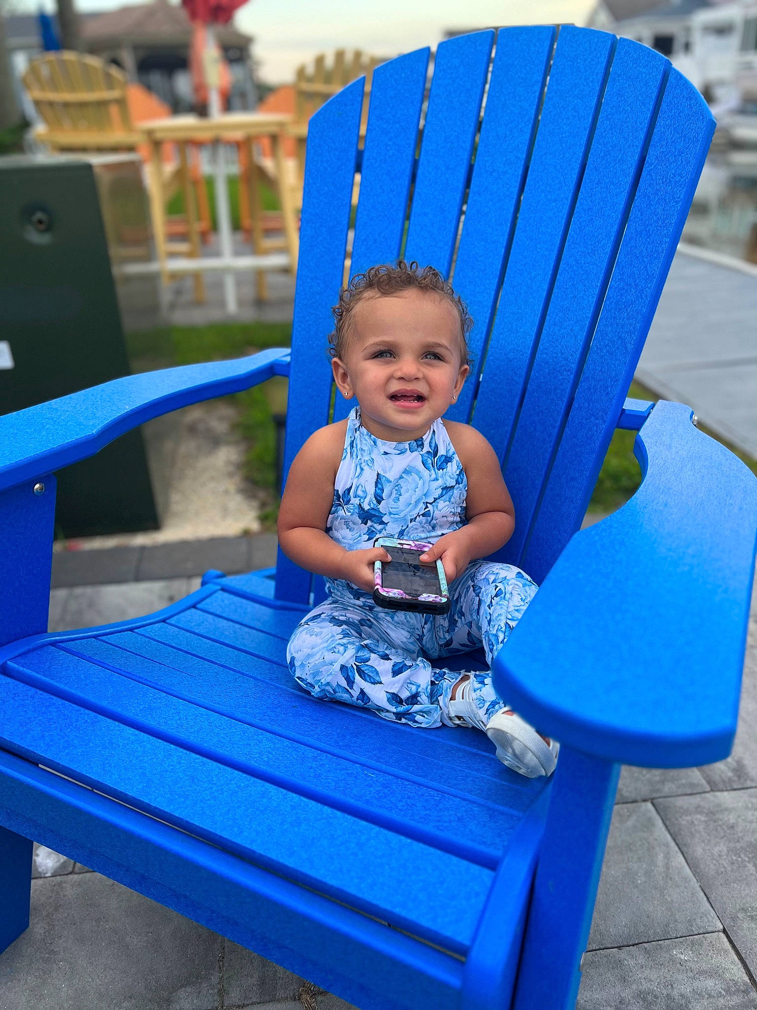 Kaylen joined the competition — help win amazing prizes! azure, baby_toddler_clothing, blue, chair, comfort, electric_blue, eye, fun, furniture, grass, green, happy, joy, leisure, outdoor_furniture, person, photograph, red, sleeve, smile