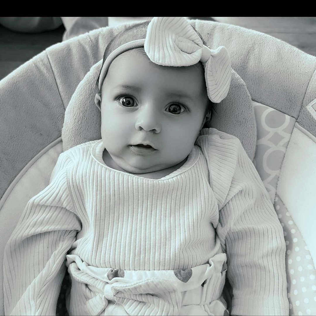 Melody participe au concours pour gagner de l'argent avec cette photo : baby, bed, bonnet, cap, clothing, crib, cushion, face, furniture, happy, hat, head, homedecor, infantbed, knitwear, newborn, person, photography, portrait, smile