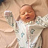 Adelyn is registered to the contest to win money with this photo: newborn, baby, infant, onesie, sleepy, stretching, hand, blanket, bed, sleepwear, moon, cloud, pattern, soft, cute, child, lying_down, indoors, comfort, peaceful