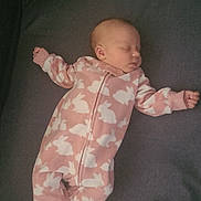 Adelyn joined the competition — help win amazing prizes! baby, bed, bunny_pattern, child, clothing, cute, face, footed_pajamas, indoor, infant, mattress, newborn, onesie, pacifier, peaceful, pink, resting, sleeping, sleepwear, small