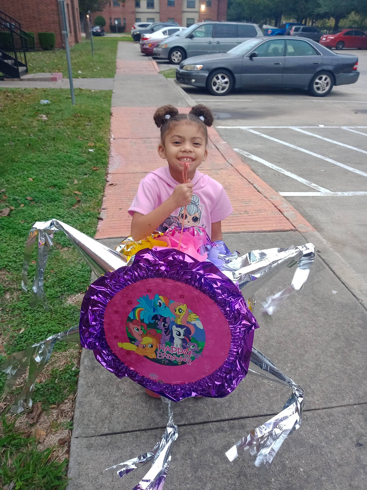 Mialynn is registered to the contest to win money with this photo: asphalt, automotive_wheel_system, car, dress, event, family_car, fun, grass, idiophone, joy, leisure, magenta, motor_vehicle, musical_instrument, person, pink, plant, pole, recreation, tire