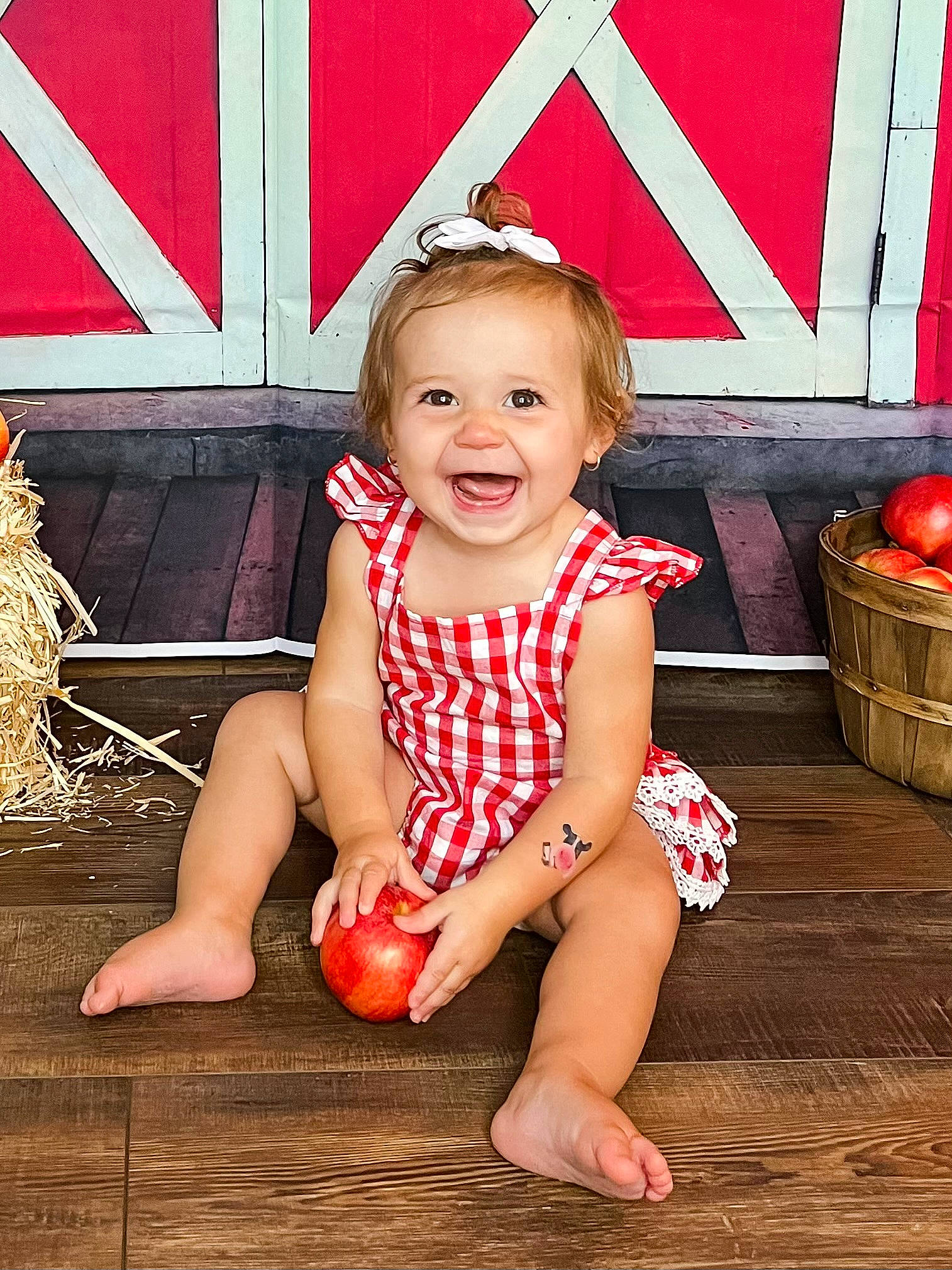 Aspen joined the competition — help win amazing prizes! baby_toddler_clothing, barefoot, child, dress, event, eye, foot, fun, happy, human_leg, joy, leisure, pattern, person, red, sitting, skin, smile, standing, thigh