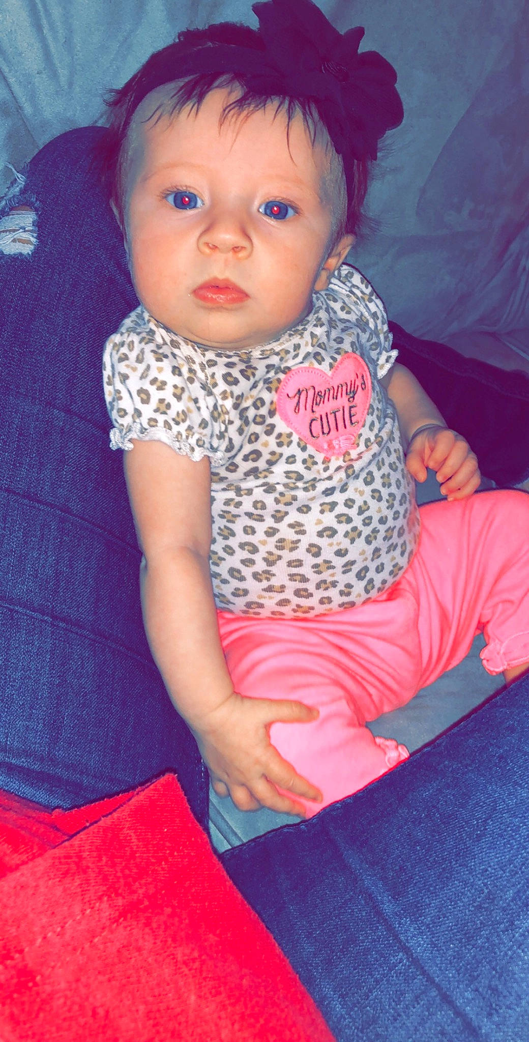 Audrie is registered to the contest to win money with this photo: baby, baby_toddler_clothing, cheek, child, chin, eye, face, fun, head, iris, lip, nose, person, pink, play, sitting, skin, smile, toddler