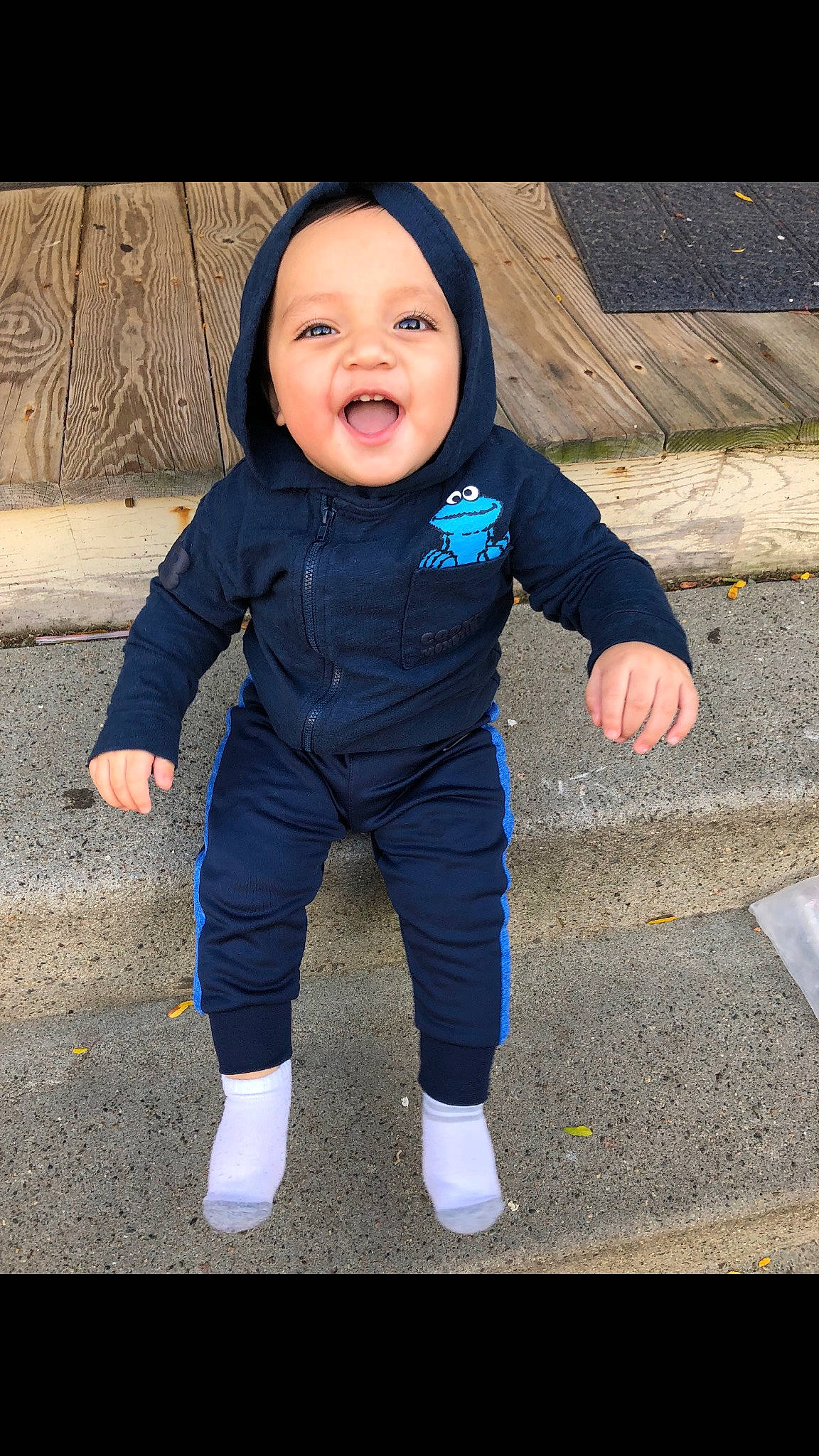 Lionel is registered to the contest to win money with this photo: baby, blue, cheek, child, cool, electric_blue, face, jacket, jeans, nose, outerwear, person, smile, standing, toddler
