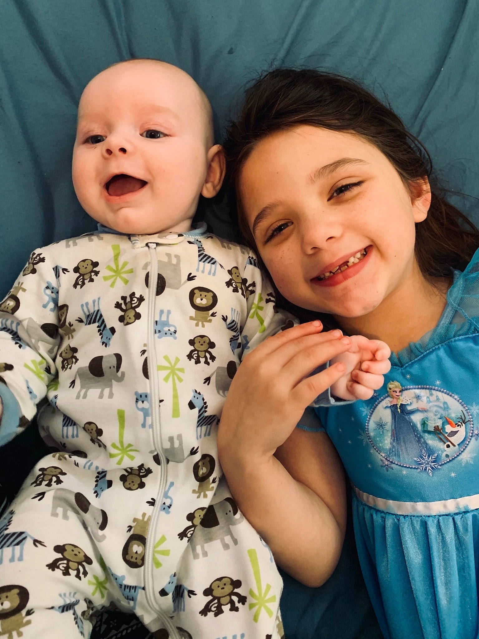 Aaden is registered to the contest to win money with this photo: baby, baby_products, baby_toddler_clothing, cheek, child, ear, eye, facial_expression, happy, human, iris, joy, laugh, lip, mouth, nightwear, person, skin, sleeve, toddler