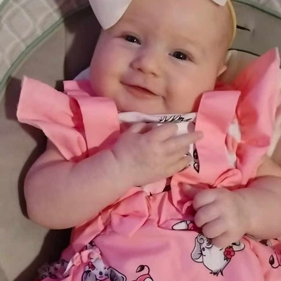 Emerie joined the competition — help win amazing prizes! accessories, baby, babylaughing, bonnet, clothing, face, happy, hat, head, headband, person, smile