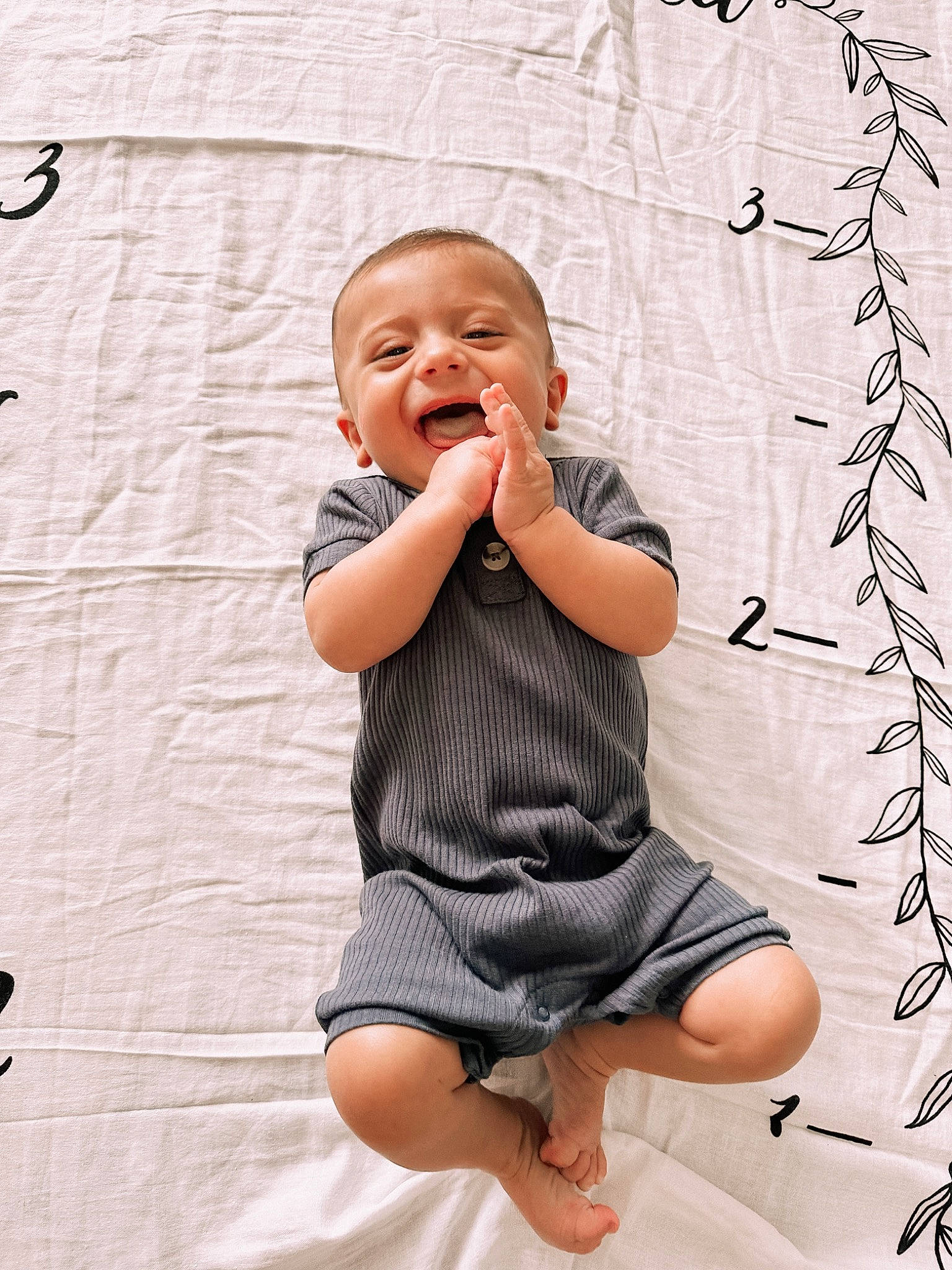 Ace is registered to the contest to win money with this photo: baby, baby_toddler_clothing, cheek, child, day_dress, dress, facial_expression, finger, flash_photography, fun, gesture, happy, pattern, person, sitting, skin, sleeve, smile, standing, t_shirt