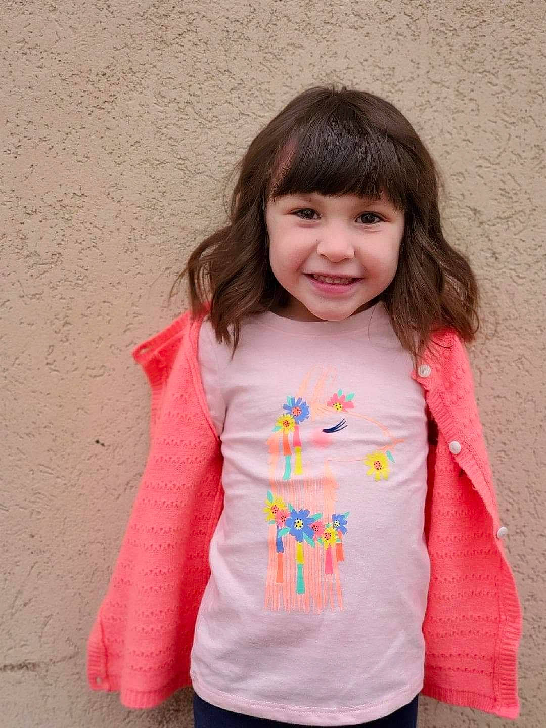 Lyra is registered to the contest to win money with this photo: child, child_model, joy, lip, outerwear, pattern, person, pink, play, sleeve, smile, t_shirt, toddler, top
