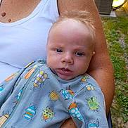 Hunter joined the competition — help win amazing prizes! baby, infant, child, portrait, face, eyes, blond_hair, sitting, being_held, adult, arms, onesie, bug_pattern, outdoor, grass, garden, speaker, daylight, close_up, family