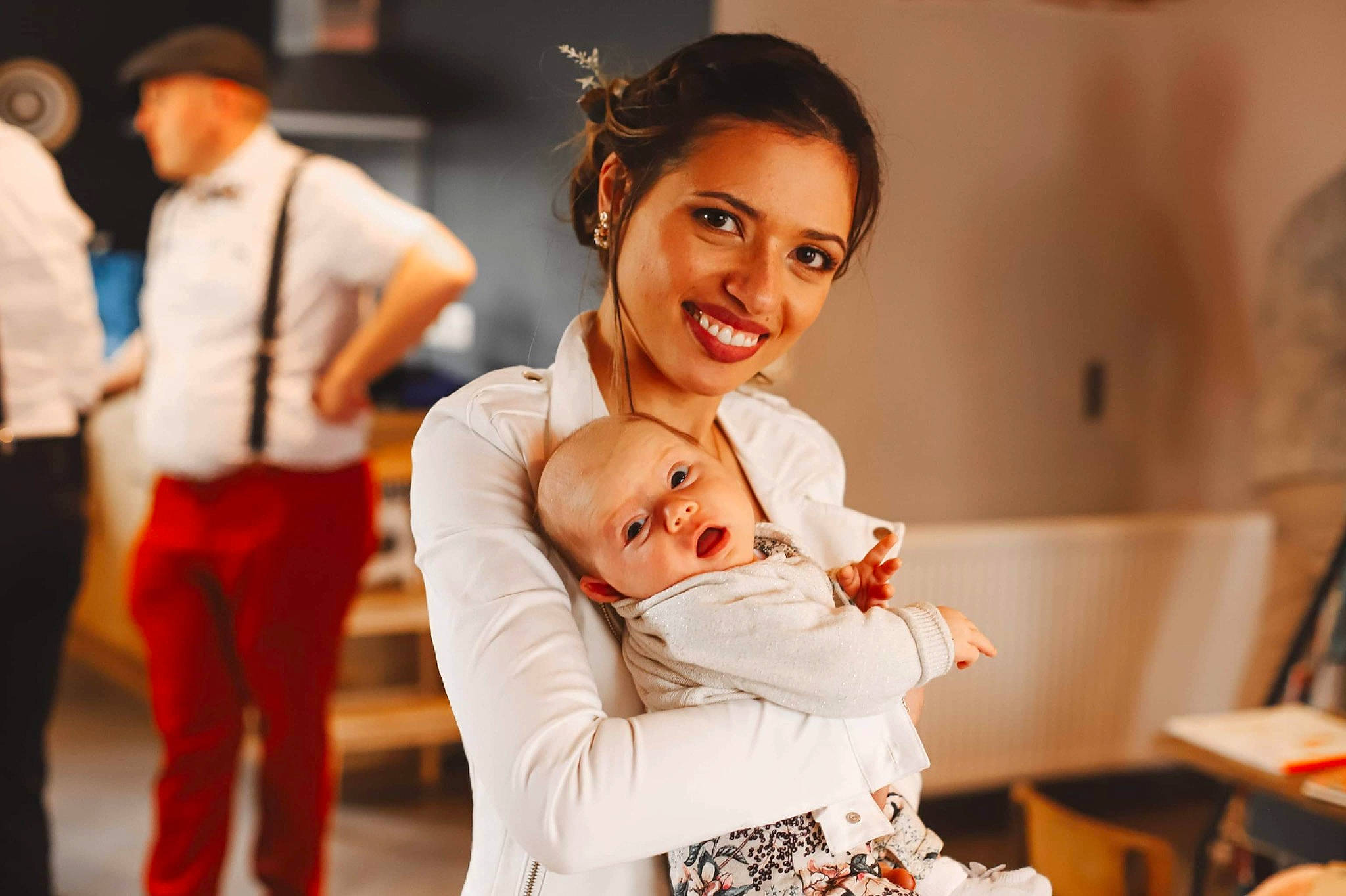 Alexia participe au concours pour gagner de l'argent avec cette photo : abdomen, baby, bridal_clothing, ceremony, chair, child, comfort, dress, event, facial_expression, flash_photography, formal_wear, fun, gesture, hairstyle, happy, joy, person, room, sitting