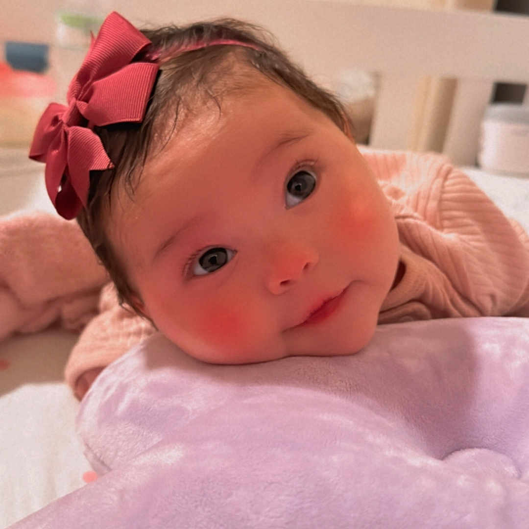 Adhara is registered to the contest to win money with this photo: accessories, baby, bed, bedroom, couch, crib, cushion, face, furniture, happy, head, homedecor, indoors, infantbed, newborn, person, photography, portrait, room, smile