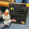 Adam joined the competition — help win amazing prizes! adult_hand, baby, birthday, blanket, chair, chalkboard, floor, graduation, hat, hospital, indoor, infant, milestone, newborn, nicu, onesie, portrait, sleeping, stroller, toy_fish