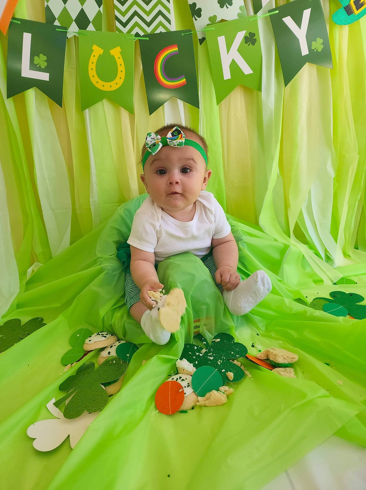 Khalia joined the competition — help win amazing prizes! baby, baby_toddler_clothing, child, event, flower, fun, grass, green, happy, headpiece, headwear, leisure, magenta, pattern, people_in_nature, person, petal, plant, room, sitting