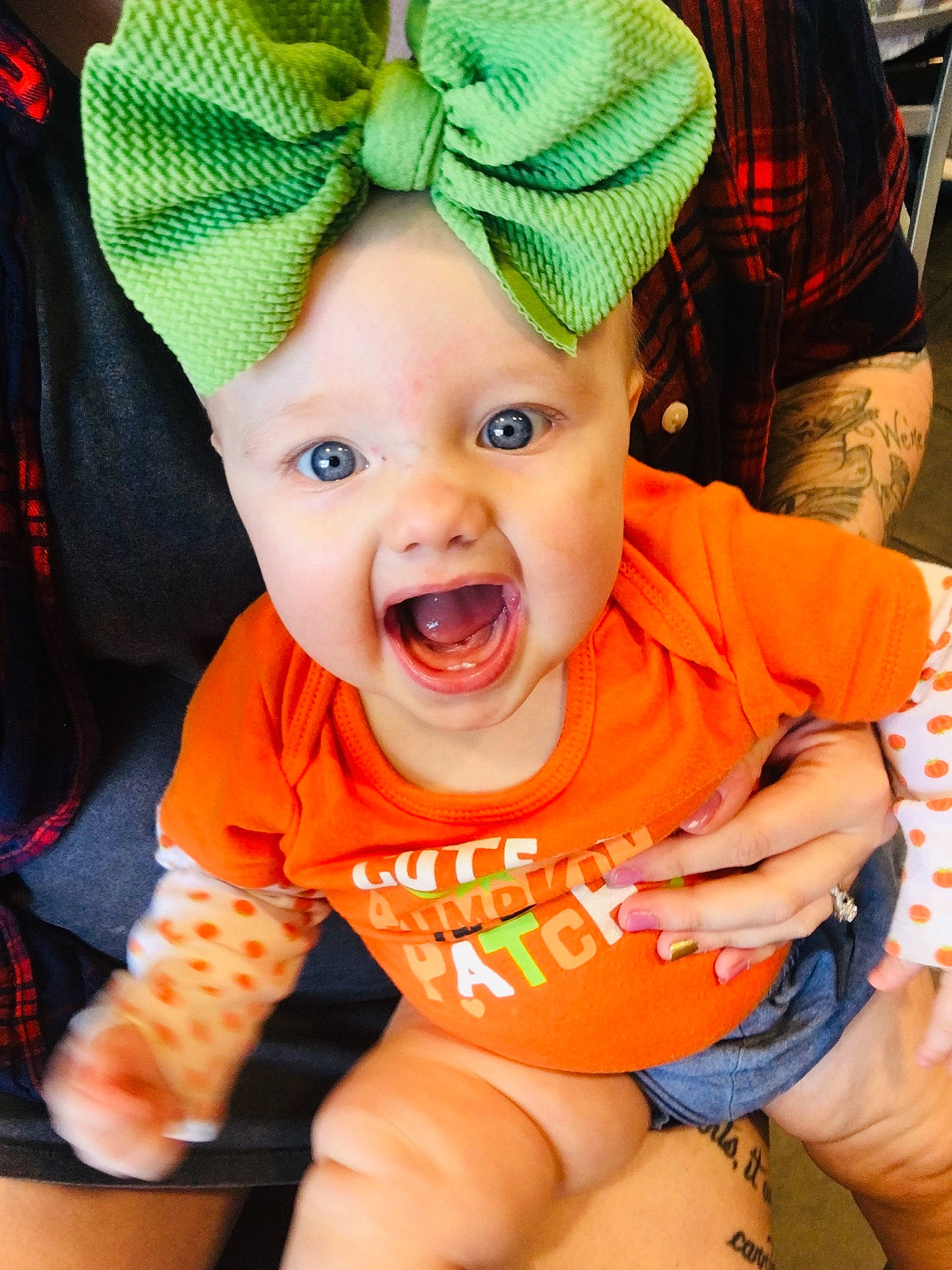 Callie is registered to the contest to win money with this photo: baby, child, cool, fashion_accessory, fun, hat, head, headgear, orange, person, play, smile, toddler