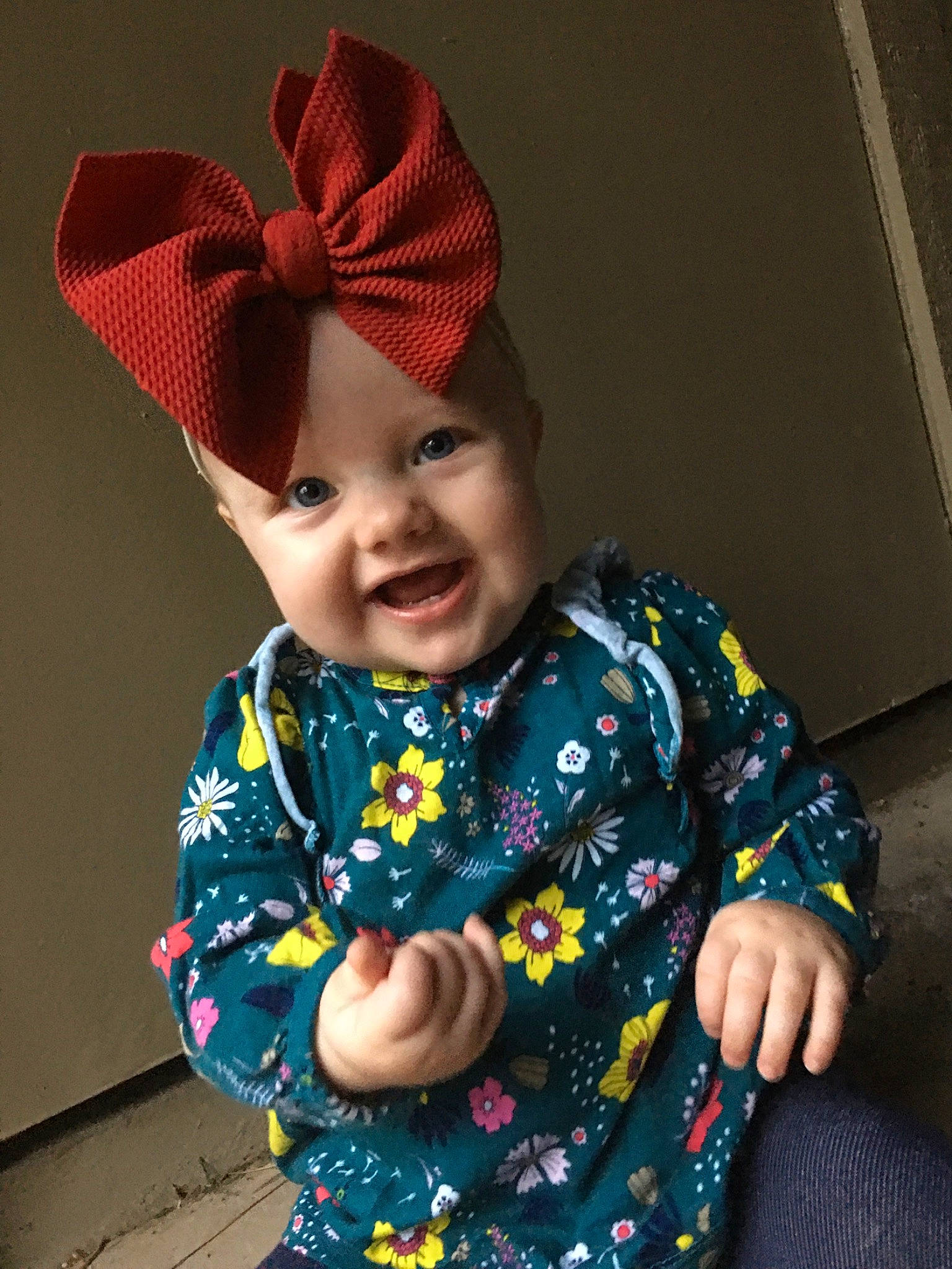 Callie joined the competition — help win amazing prizes! baby, baby_toddler_clothing, beanie, bonnet, cap, child, clothing, costume_accessory, ear, fashion_accessory, hair_accessory, hat, headgear, knit_cap, pattern, person, sleeve, smile, toddler