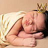 baby, sleeping, crown, blanket, infant, soft, peaceful, closeup, wrapped, cute, newborn, portrait, resting, skin, head, hand, fingers, cozy, warm, indoors