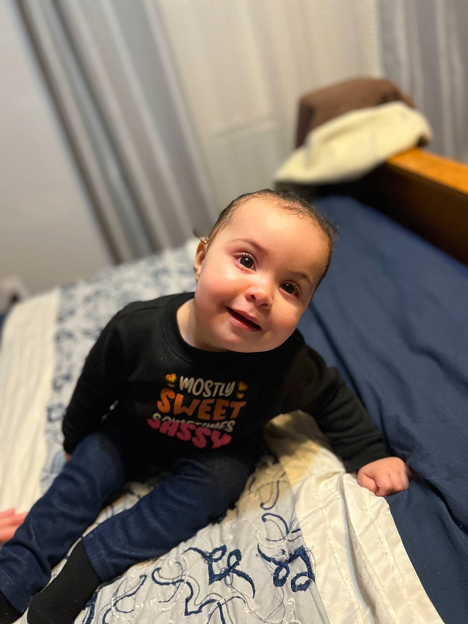 Melani joined the competition — help win amazing prizes! baby, baby_toddler_clothing, child, comfort, couch, curtain, elbow, flash_photography, flooring, fun, hand, happy, human_leg, knee, person, shoulder, sitting, sleeve, smile, t_shirt