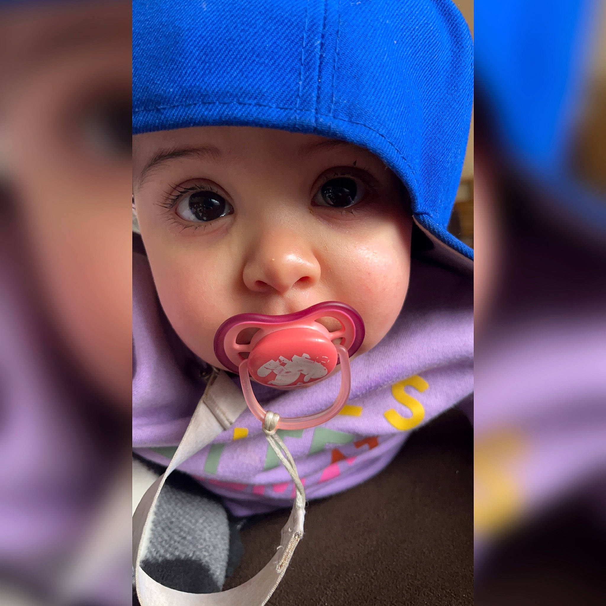 Melani is registered to the contest to win money with this photo: baby, baby_toddler_clothing, cap, cheek, child, chin, close_up, electric_blue, eyelash, facial_expression, finger, happy, headgear, headwear, knit_cap, lip, mouth, nose, organ, person