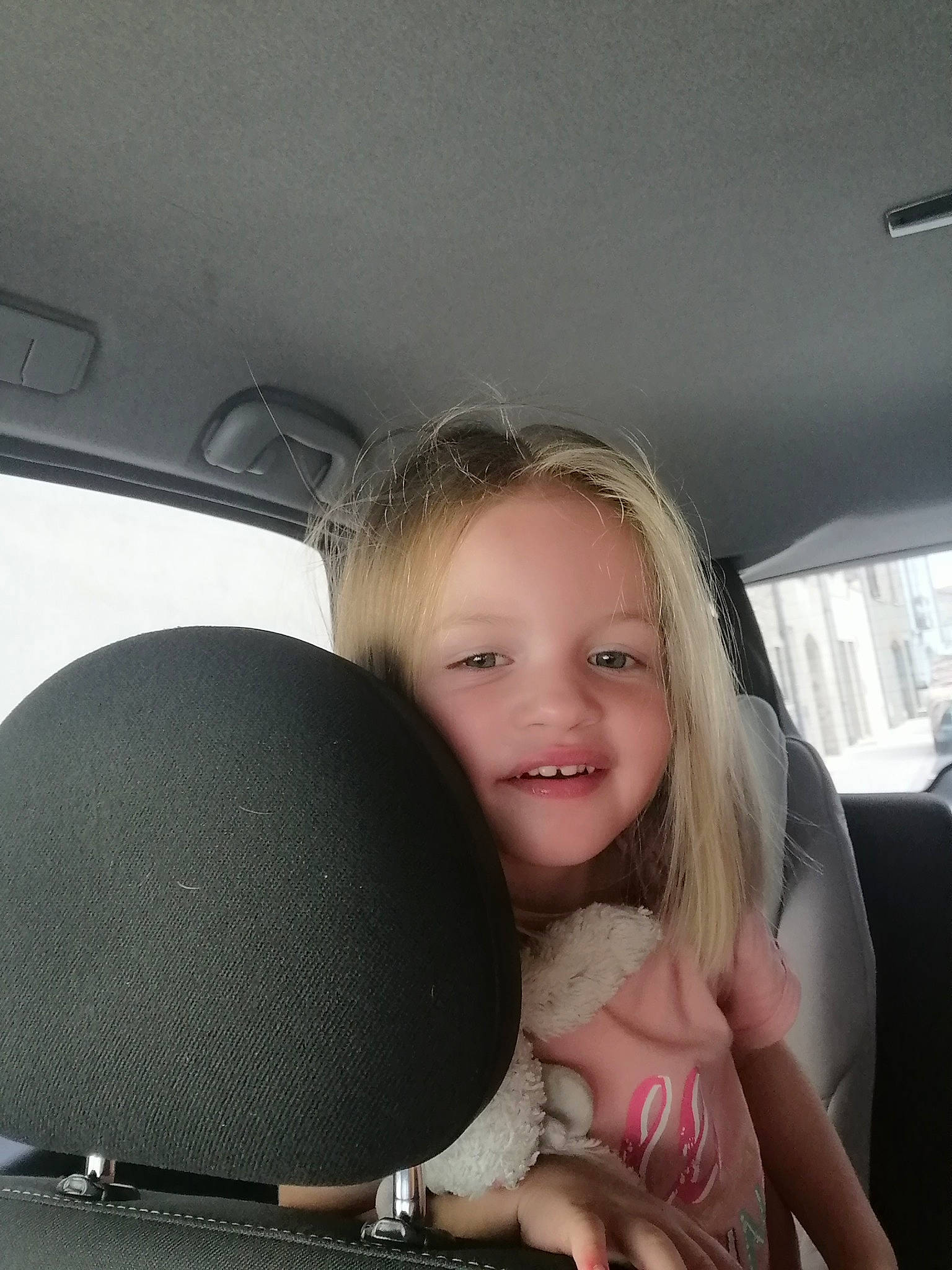 Joy participe au concours pour gagner de l'argent avec cette photo : auto_part, baby, blond, car_seat, cheek, child, face, finger, fun, hand, head, head_restraint, joy, leg, mouth, nose, person, skin, smile, technology