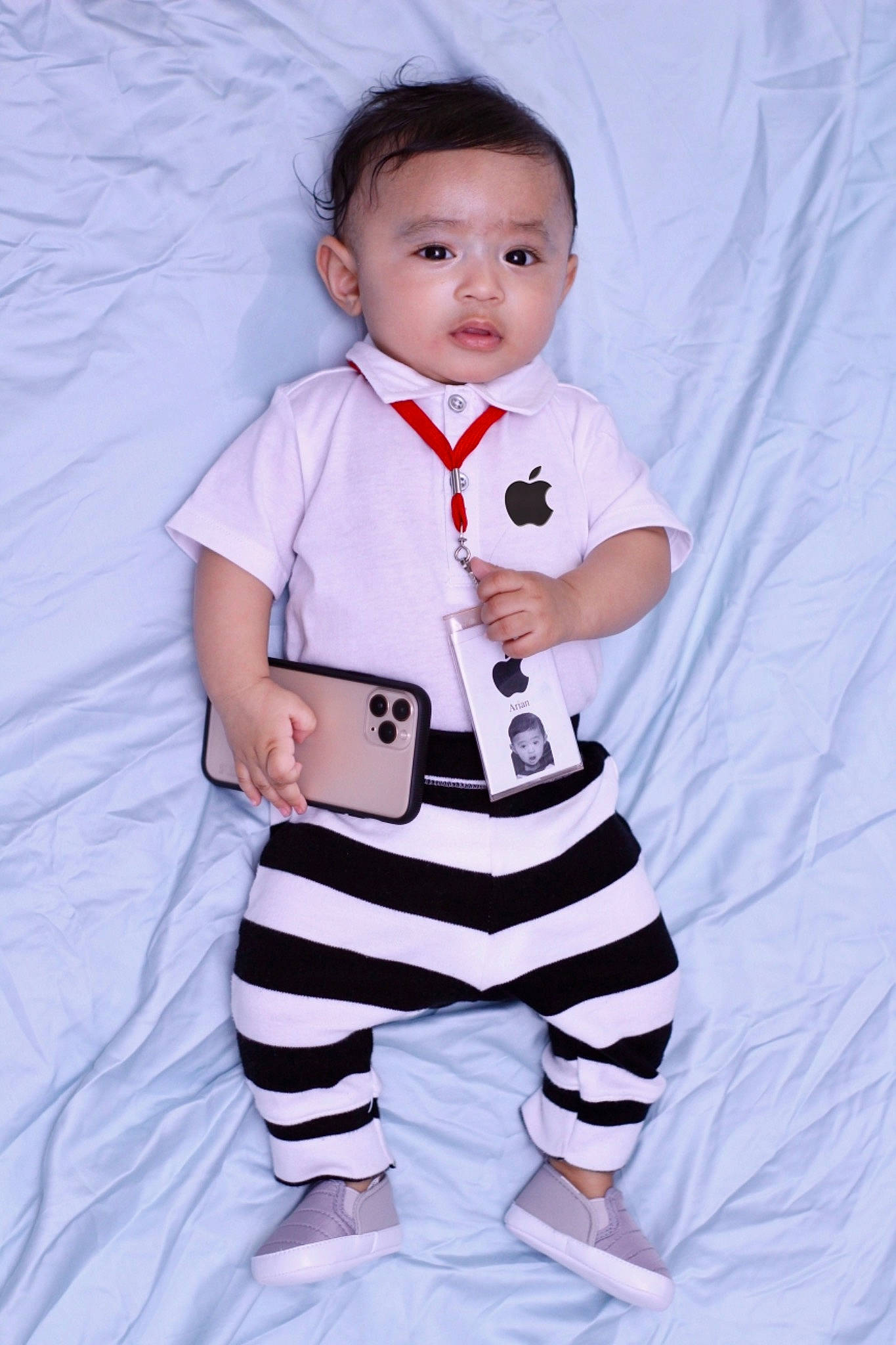 Arian joined the competition — help win amazing prizes! baby, baby_products, baby_toddler_clothing, barefoot, cheek, child, collar, comfort, finger, foot, joint, linens, nightwear, pajamas, person, pink, product, skin, sleeve, sock