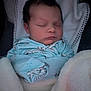 Kellen is registered to the contest to win money with this photo: baby, newborn, sleeping, blanket, onesie, infant, cozy, soft, cute, face, child, peaceful, wrapped, clothing, portrait, indoor, young, resting, head, comfort