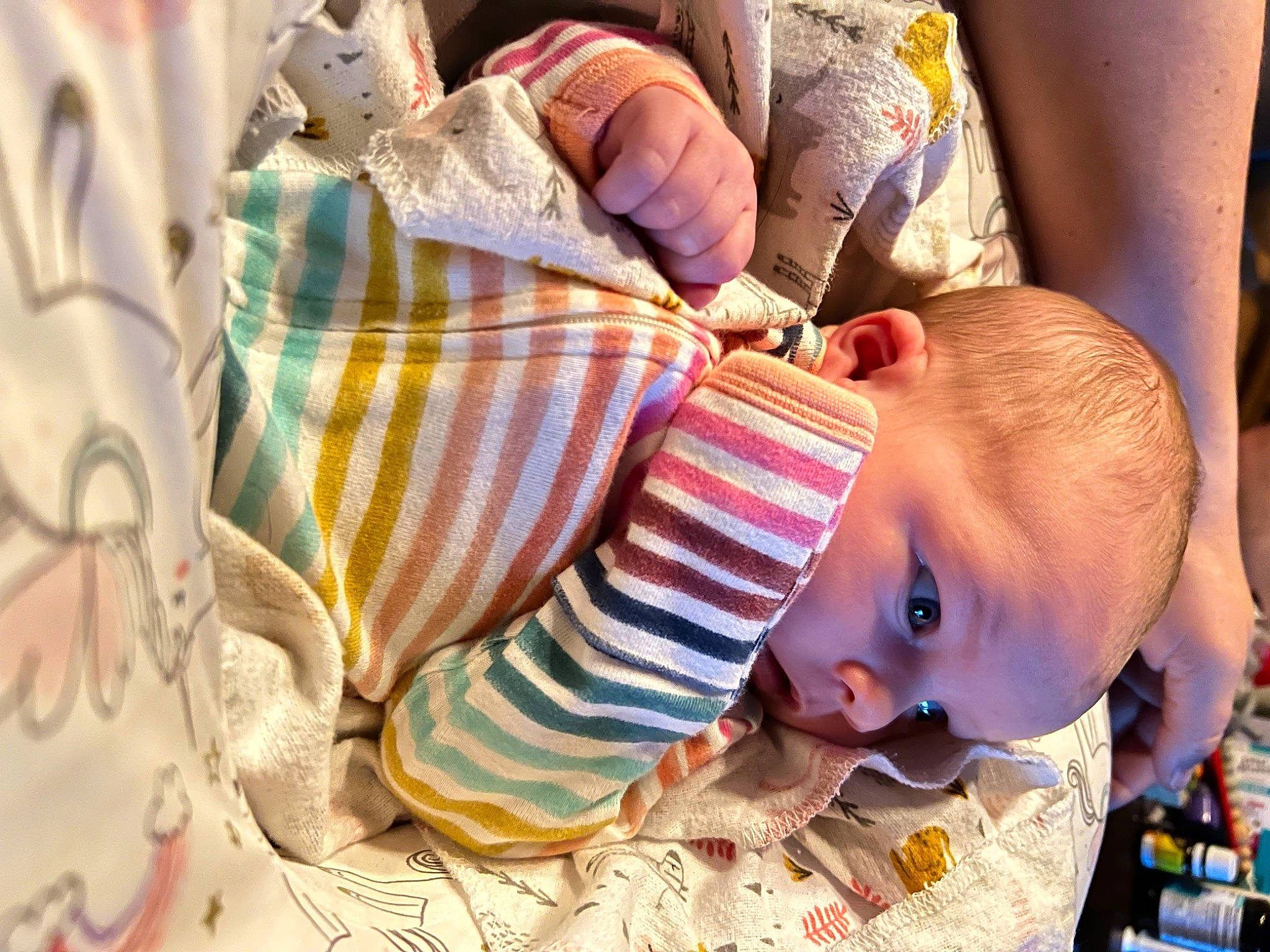 Freya is registered to the contest to win money with this photo: baby, baby_products, baby_toddler_clothing, bedtime, cheek, child, comfort, fun, happy, linens, pattern, person, plaid, play, room, sitting, skin, tartan, toddler, tree