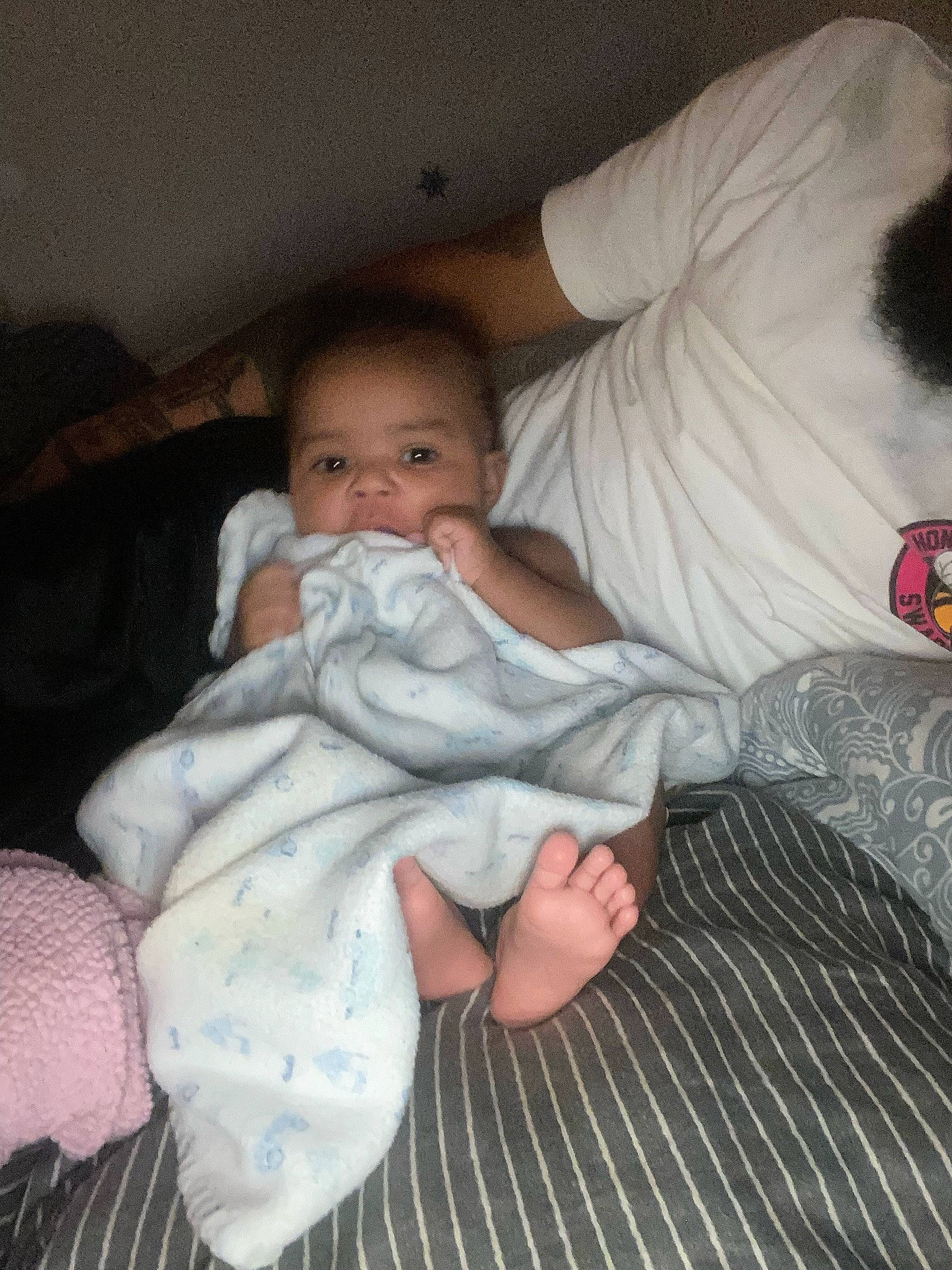 Myla joined the competition — help win amazing prizes! arm, baby, baby_toddler_clothing, cheek, child, comfort, finger, foot, gesture, head, human_body, human_leg, lap, leg, linens, mouth, nose, person, skin, thumb