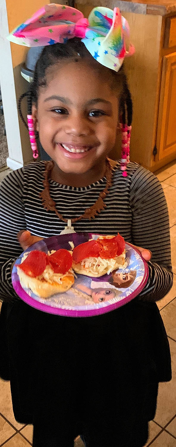 Kennedy joined the competition — help win amazing prizes! baked_goods, chair, comfort_food, cuisine, dish, fast_food, food, food_craving, fork, fried_food, ingredient, joy, junk_food, person, plate, platter, recipe, sharing, smile, staple_food