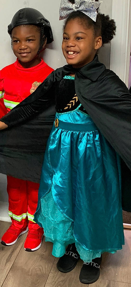 Kennedy joined the competition — help win amazing prizes! blue, child, costume, electric_blue, entertainment, event, fashion, fashion_design, formal_wear, fun, happy, headwear, jewellery, joy, necklace, outerwear, people, performing_arts, person, smile