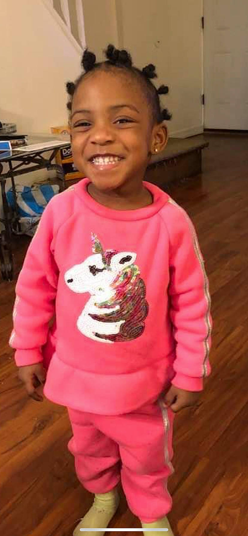 Khadiyah is registered to the contest to win money with this photo: baby_toddler_clothing, child, dessert, facial_expression, flooring, fun, hairstyle, happy, hardwood, joy, magenta, neck, pattern, person, pink, skin, sleeve, smile, stuffed_toy, t_shirt