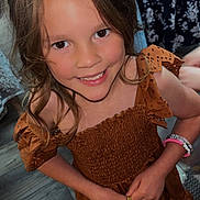 Brooklyn joined the competition — help win amazing prizes! child, girl, smiling, brown_hair, dress, bracelet, plastic_bag, indoor, wooden_floor, patterned_clothing, happy, portrait, person, holding, casual, cute, standing, colorful, young, fashion