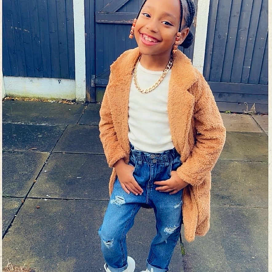 Haile Avah is registered to the contest to win money with this photo: blazer, boy, child, clothing, coat, face, footwear, happy, head, jacket, jeans, knitwear, male, pants, person, photography, portrait, shoe, standing, sweater