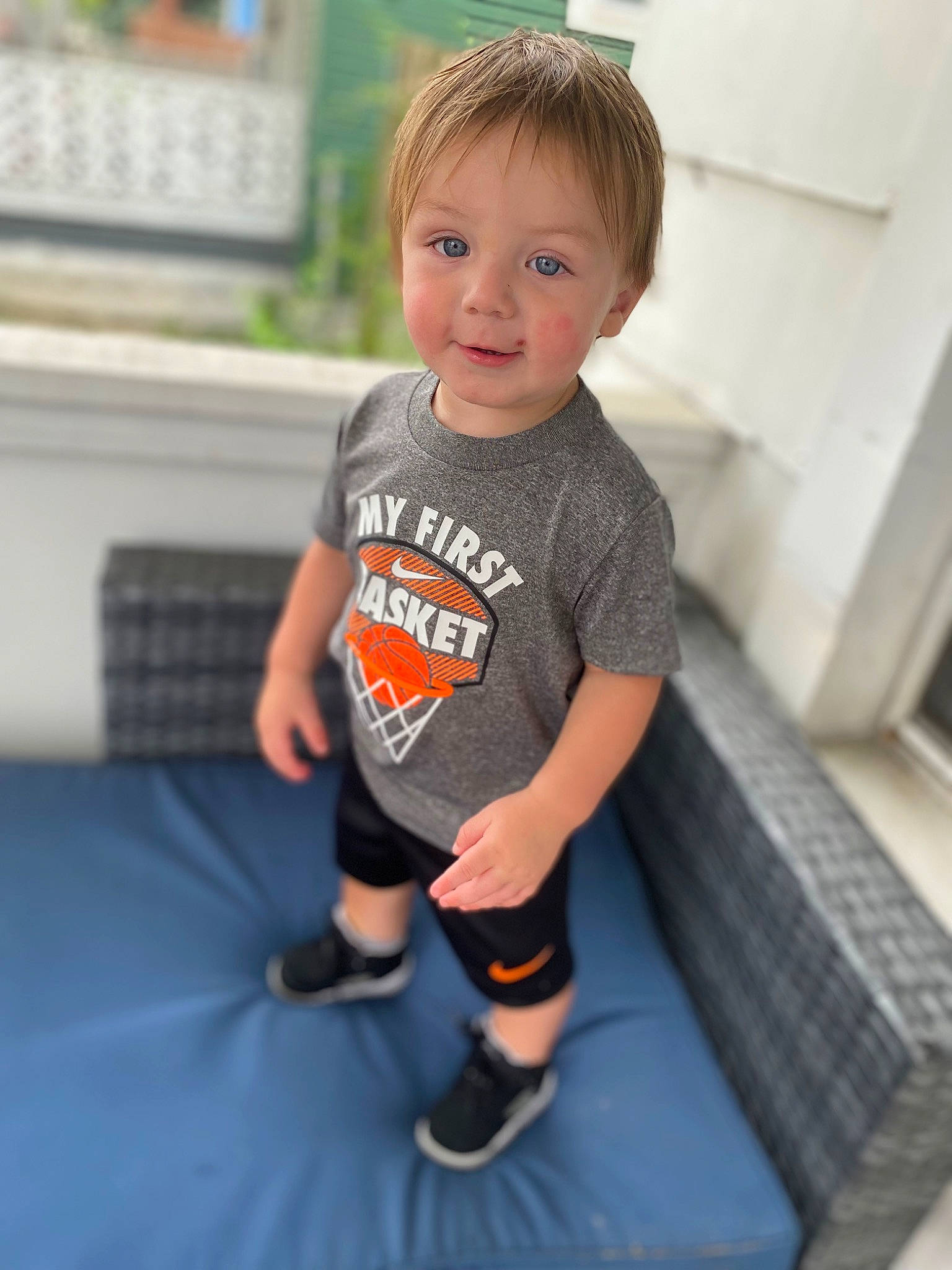 Reymon is registered to the contest to win money with this photo: arm, baby_toddler_clothing, comfort, electric_blue, floor, flooring, hair, hairstyle, happy, head, human_body, joint, knee, leisure, person, shorts, sleeve, sportswear, standing, t_shirt