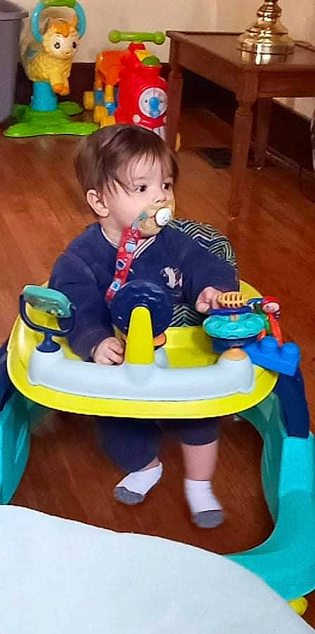 Rhythm is registered to the contest to win money with this photo: baby, baby_products, baby_toddler_clothing, bib, chair, cheek, child, event, face, fun, happy, head, leisure, people, person, product, recreation, sharing, sitting, snapshot