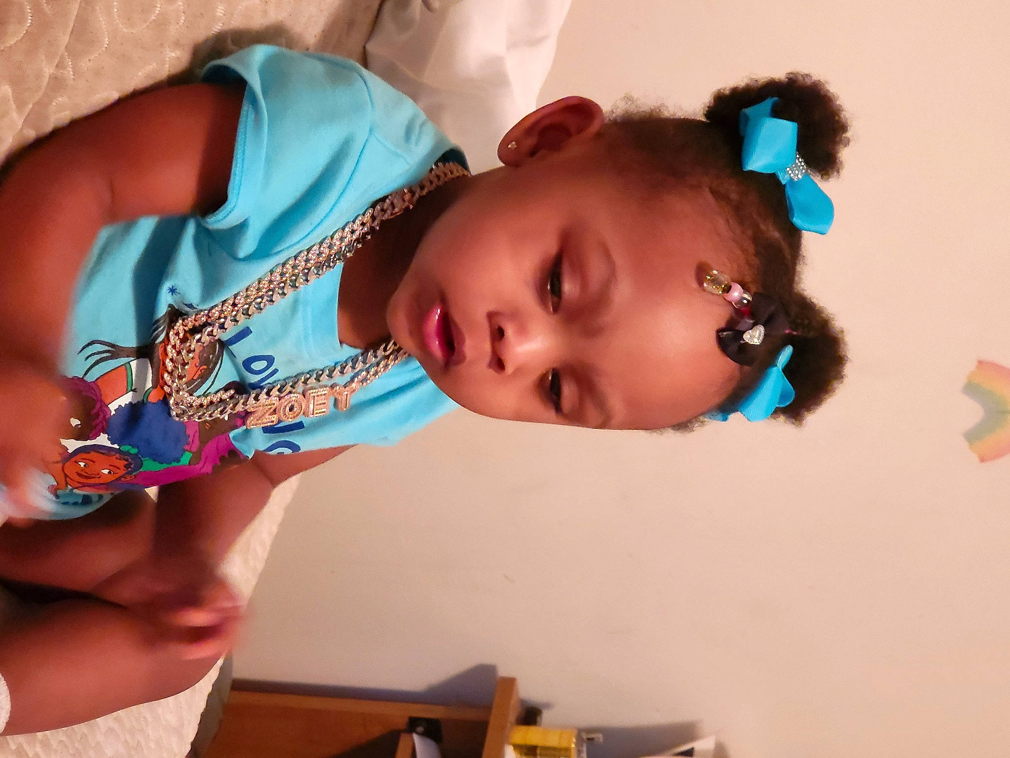 Zoey'Reign is registered to the contest to win money with this photo: cheek, chest, child, ear, electric_blue, eyelash, fashion_accessory, fun, hair_accessory, hair_coloring, hairstyle, happy, mouth, nail, neck, pattern, person, skin, toddler, wrist