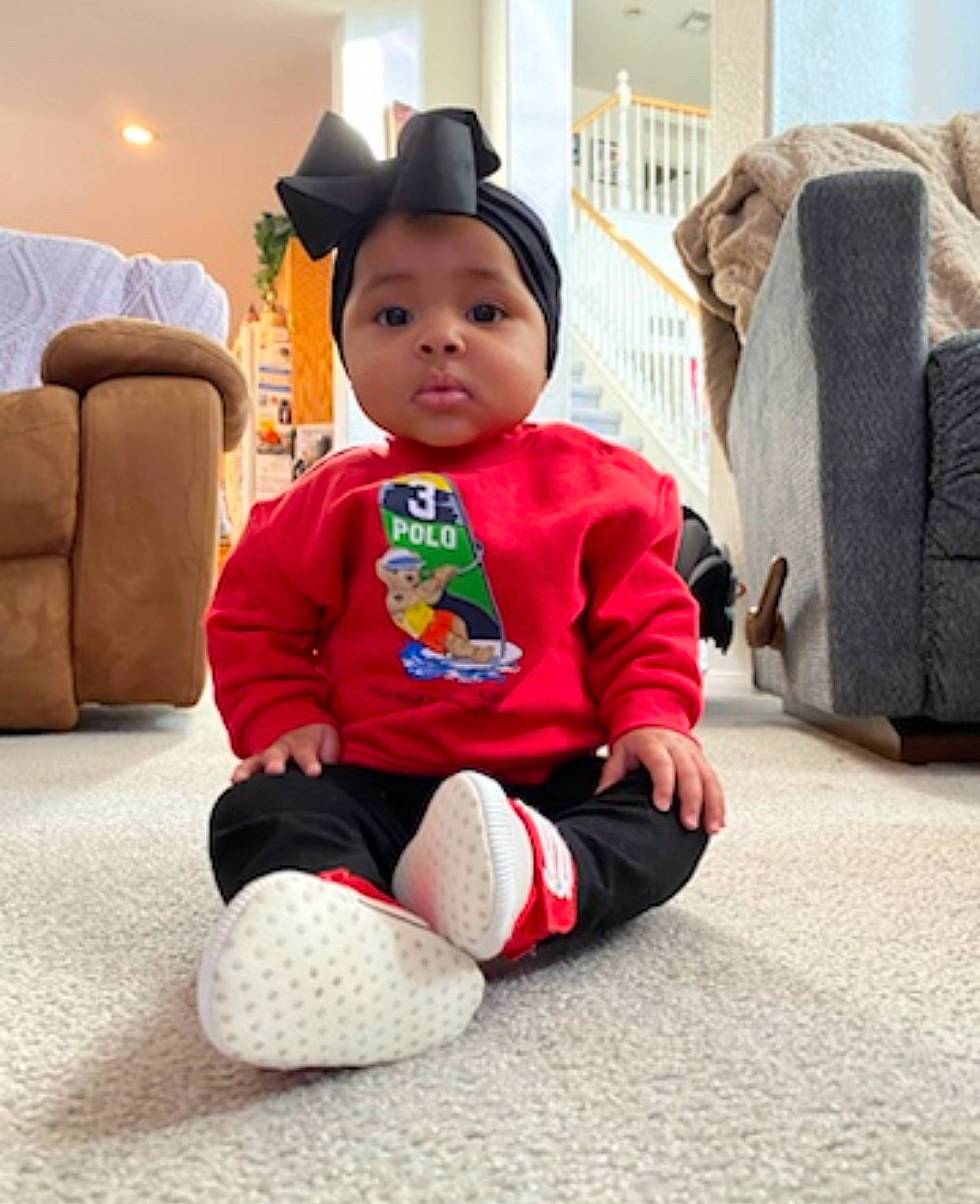 Leia is registered to the contest to win money with this photo: baby, baby_toddler_clothing, cap, carmine, child, comfort, costume, costume_hat, couch, flooring, fun, fur, happy, hat, leisure, person, sitting, sleeve, stuffed_toy, textile