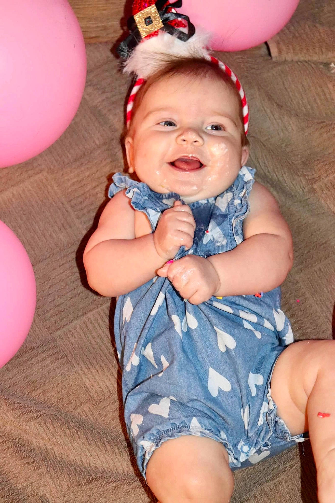 Nevaeh is registered to the contest to win money with this photo: baby_toddler_clothing, balloon, child, eye, facial_expression, fun, happy, head, human_body, iris, organ, party_supply, person, photograph, pink, red, skin, smile, thigh, toddler