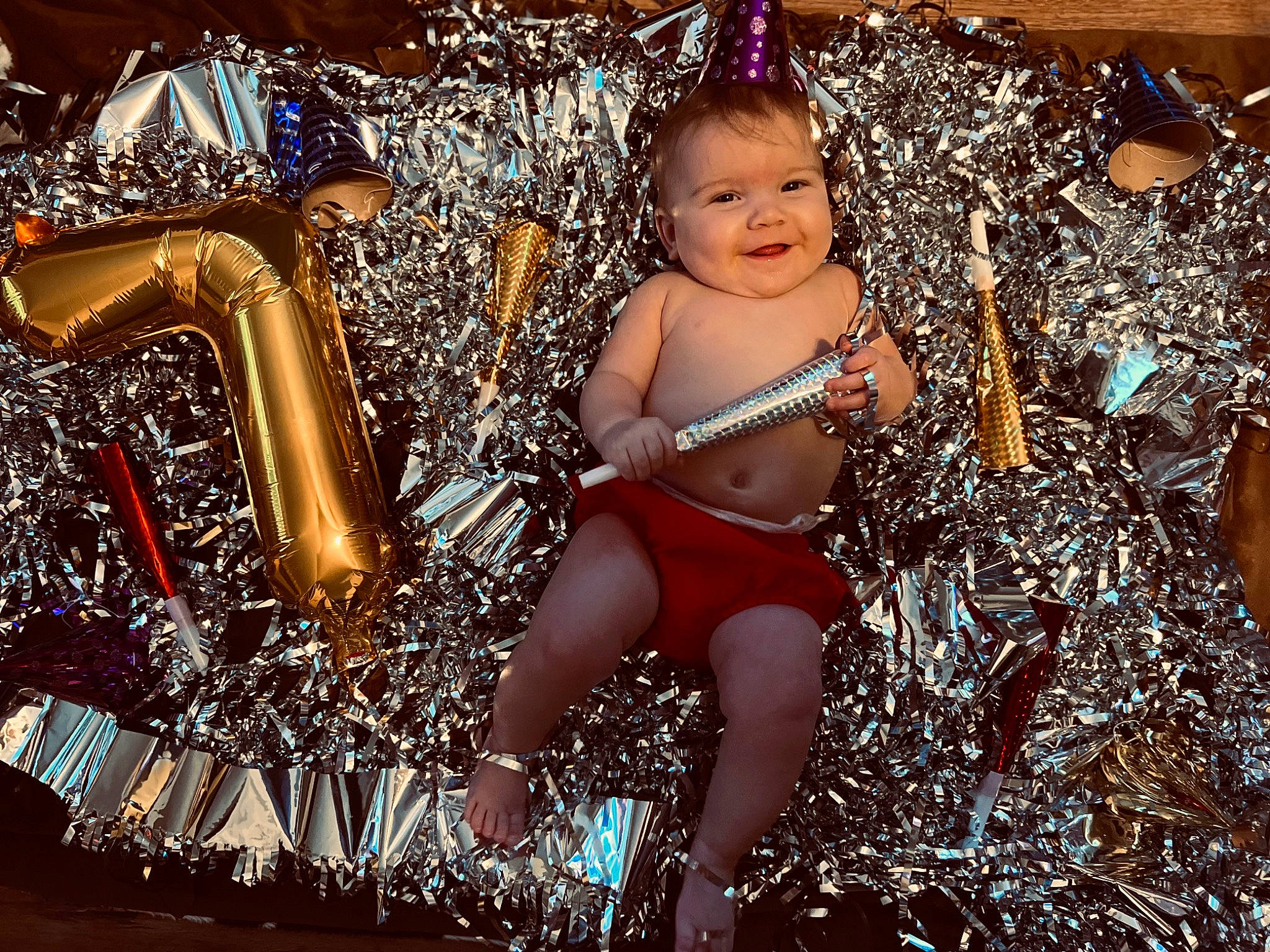 Nevaeh joined the competition — help win amazing prizes! christmas, christmas_decoration, christmas_eve, christmas_ornament, event, fashion_accessory, flash_photography, fun, happy, holiday, human_leg, joy, leisure, metal, ornament, people_in_nature, person, sitting, smile, thigh