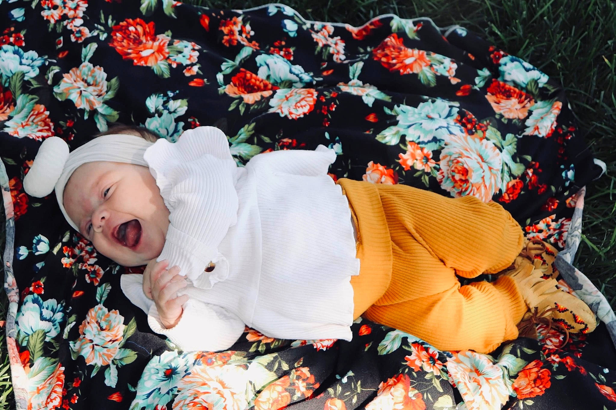 Nevaeh joined the competition — help win amazing prizes! baby, baby_products, baby_toddler_clothing, blossom, child, costume, fashion_accessory, grass, happy, hat, human_body, linens, pattern, person, petal, plant, portrait_photography, sleeve, textile, toddler