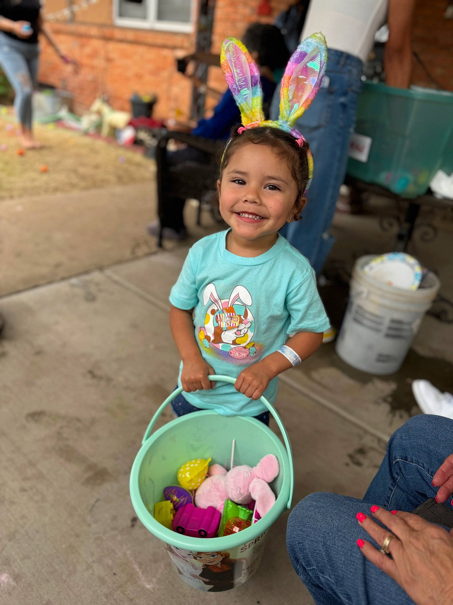 Camila Rae joined the competition — help win amazing prizes! bucket, child, event, fun, green, happy, holiday, joy, leisure, market, party_supply, person, photograph, play, public_space, recreation, shorts, smile, snapshot, toddler
